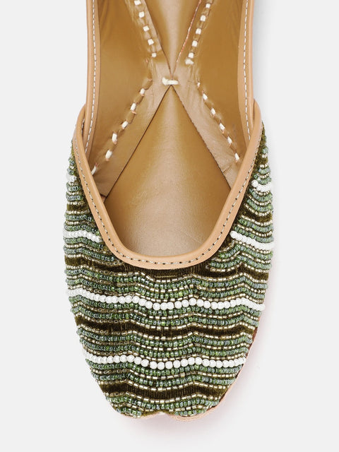 A pair of green mojaris