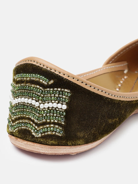 A pair of green mojaris