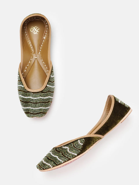 A pair of green mojaris